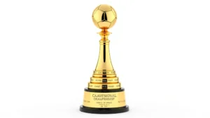 Shiny gold perpetual trophy with football topper and multiple engraved bands stacked on base, professional championship award on white background